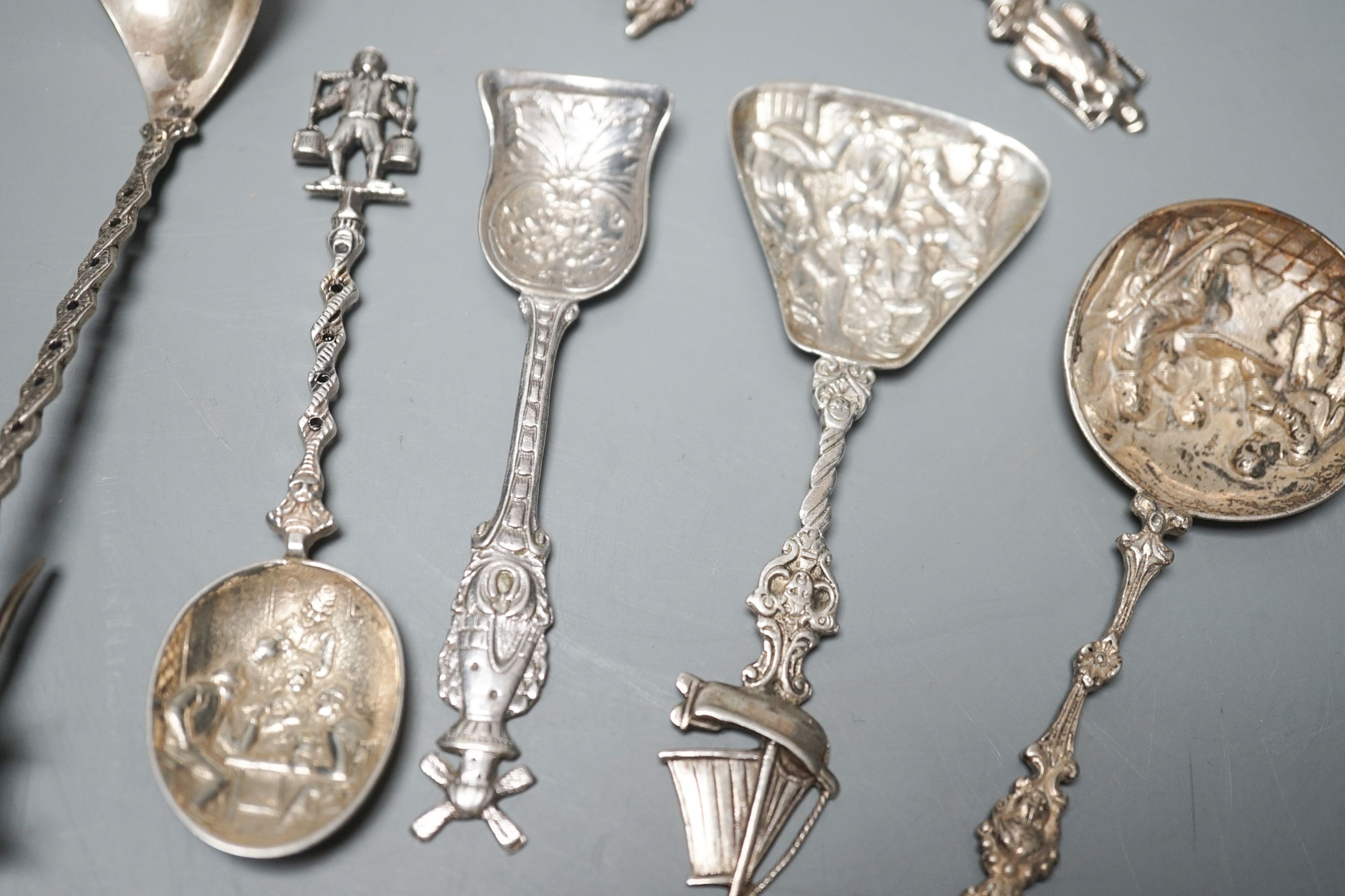 A small group of assorted mainly Dutch white metal spoons.